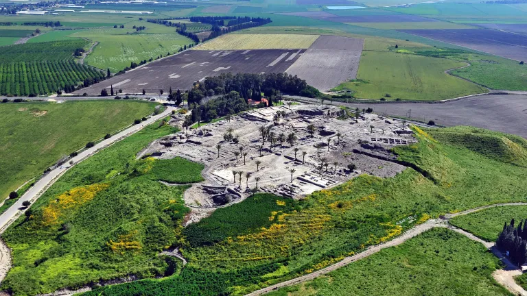 The ruins of Tel Megiddo today with the Valley of Jezreel behind.