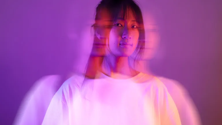 A photo illustration of a woman blurred.