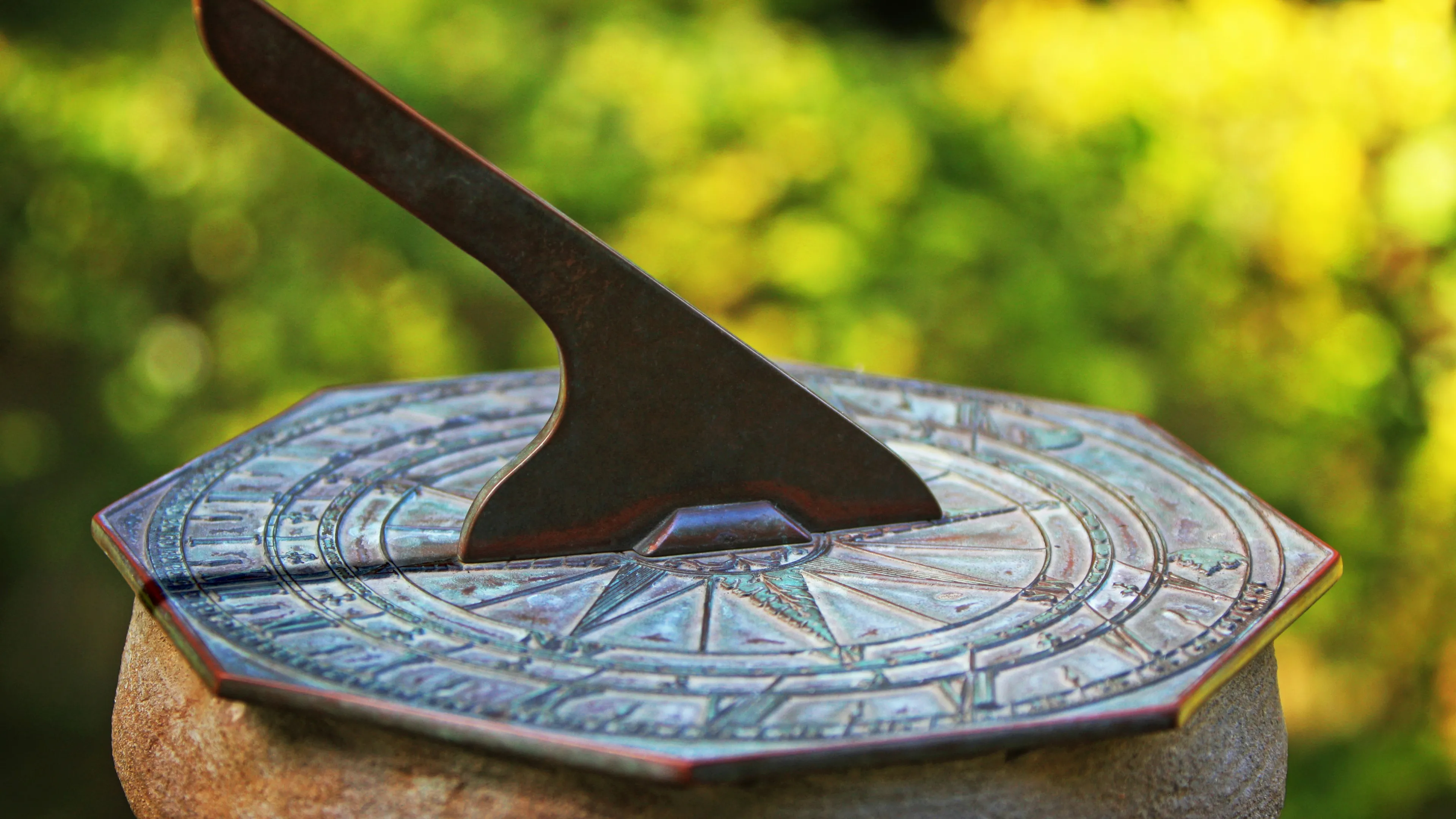 A sundial in a garden.